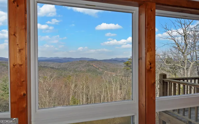 a kitchen with stainless steel appliances granite countertop a stove sink and cabinets
