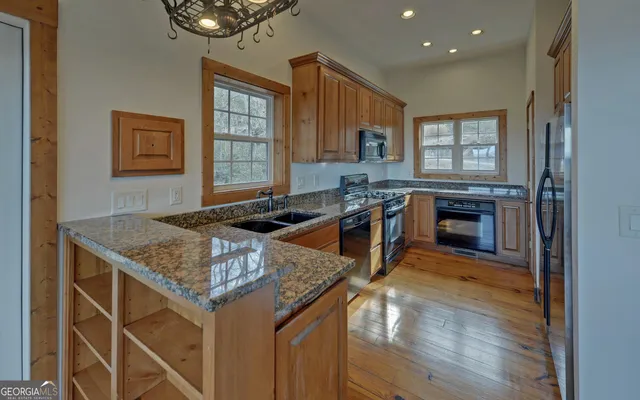 a spacious bedroom with a bed and a walk in closet