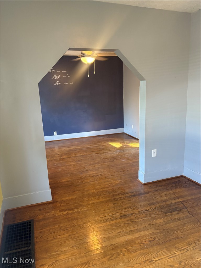 11 Front Street Rittman, OH 44270 - Photo 6 of 31 Spare room with ceiling fan and wood finished floors