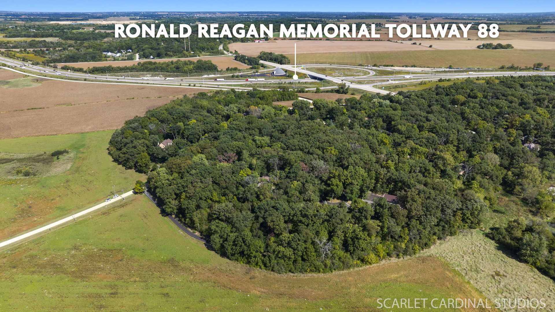 a view of a park with welcome board