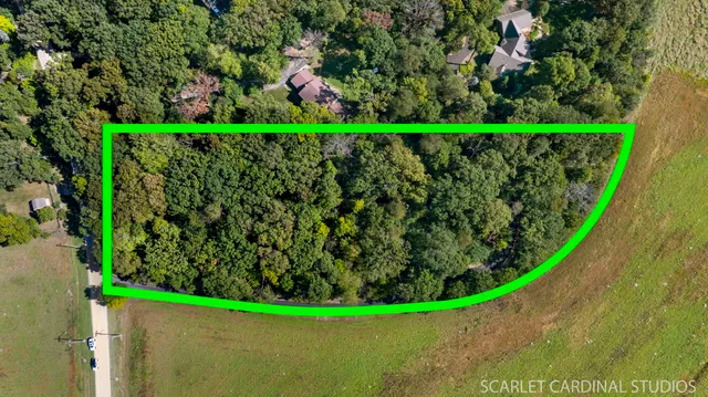 a view of a wooden fence