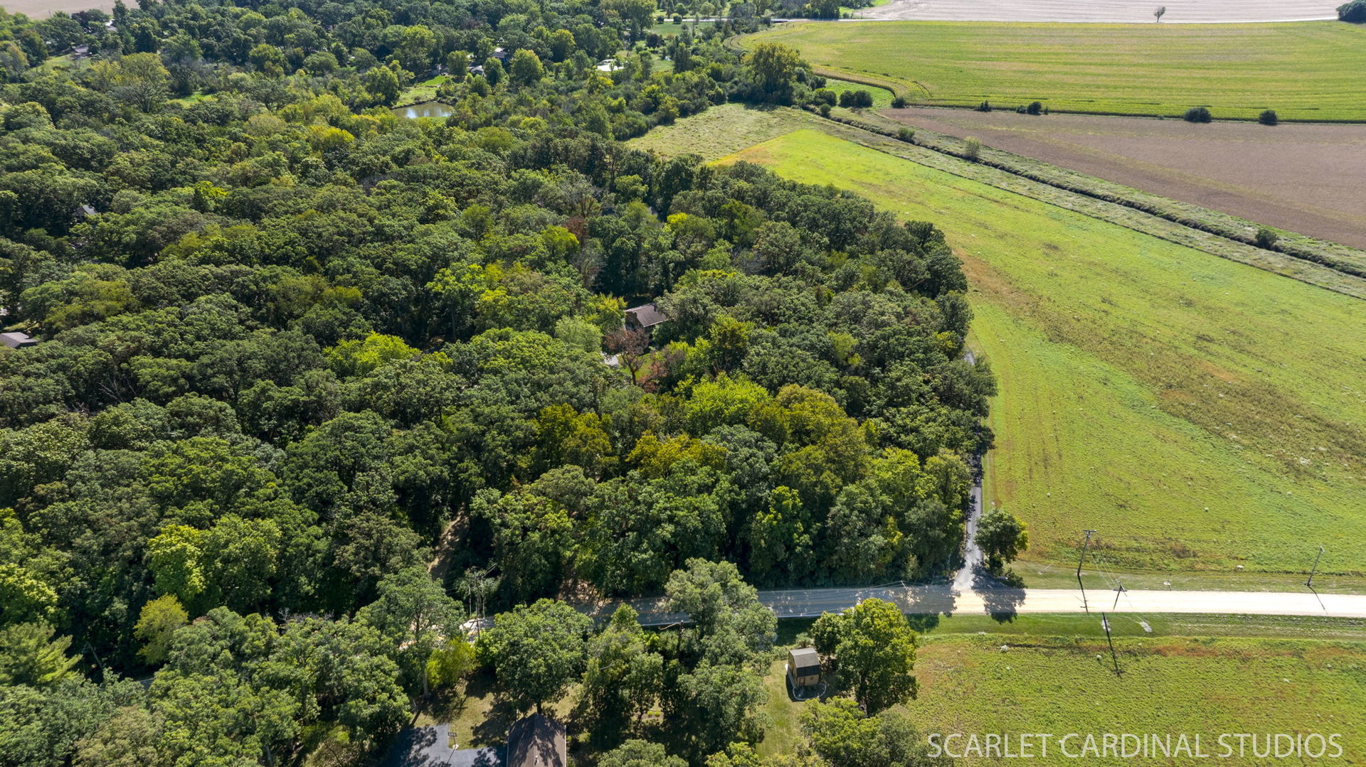 0 Finley Road Sugar Grove, IL 60554 - Photo 3 of 11 an aerial view of a residential houses with outdoor space and trees all around