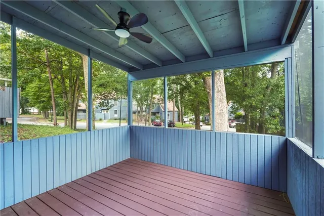 a view of outdoor space with wooden floor