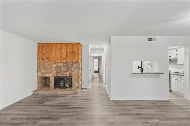 a view of a livingroom with a fireplace