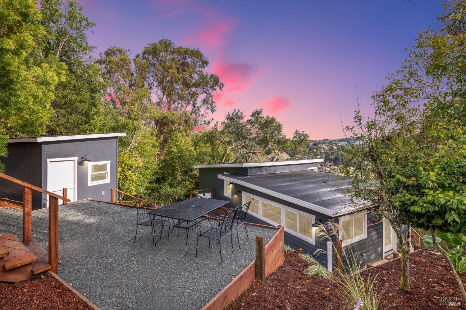 64 Mountain View Road Fairfax, CA 94930 - Photo 1 of 1 a view of a patio with a table and chairs