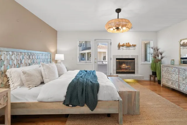 a bedroom with a bed and a table