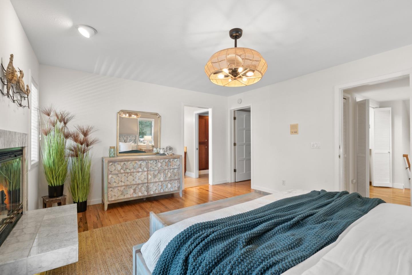 152 Frederick Street Santa Cruz, CA 95062 - Photo 19 of 64 a bedroom with a bed and a table