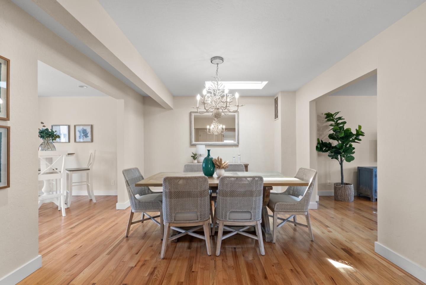 152 Frederick Street Santa Cruz, CA 95062 - Photo 37 of 64 a view of a dining room with furniture window and wooden floor
