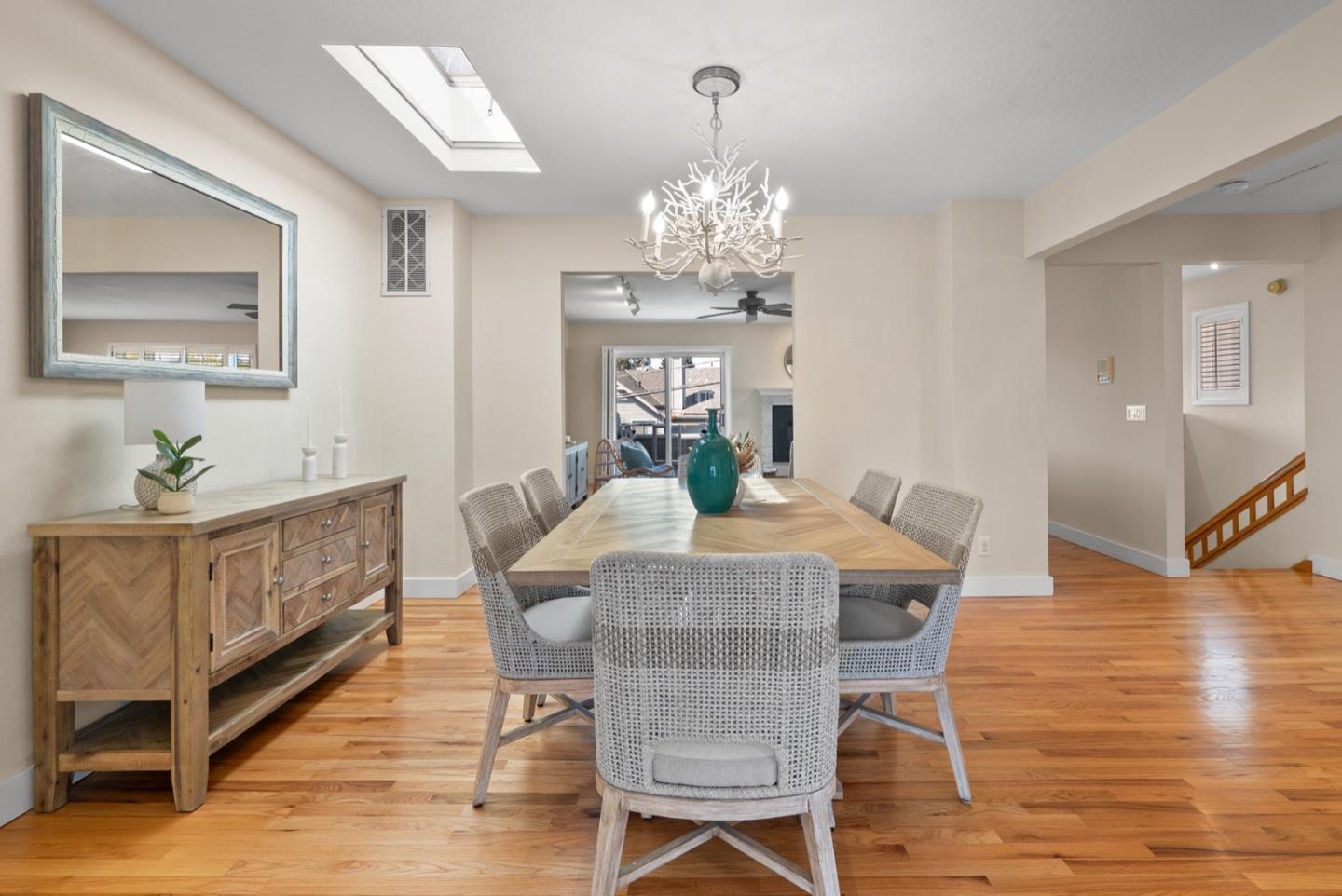 152 Frederick Street Santa Cruz, CA 95062 - Photo 38 of 64 a view of a dining room with furniture wooden floor and chandelier