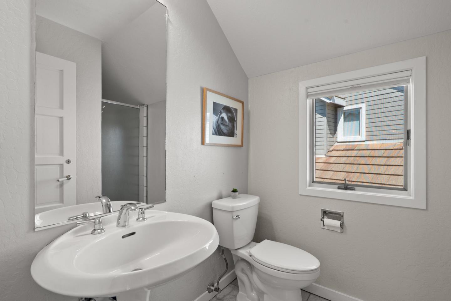 152 Frederick Street Santa Cruz, CA 95062 - Photo 52 of 64 a bathroom with a sink and a toilet