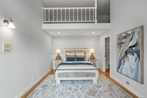 a bathroom with a sink a large mirror and a shower