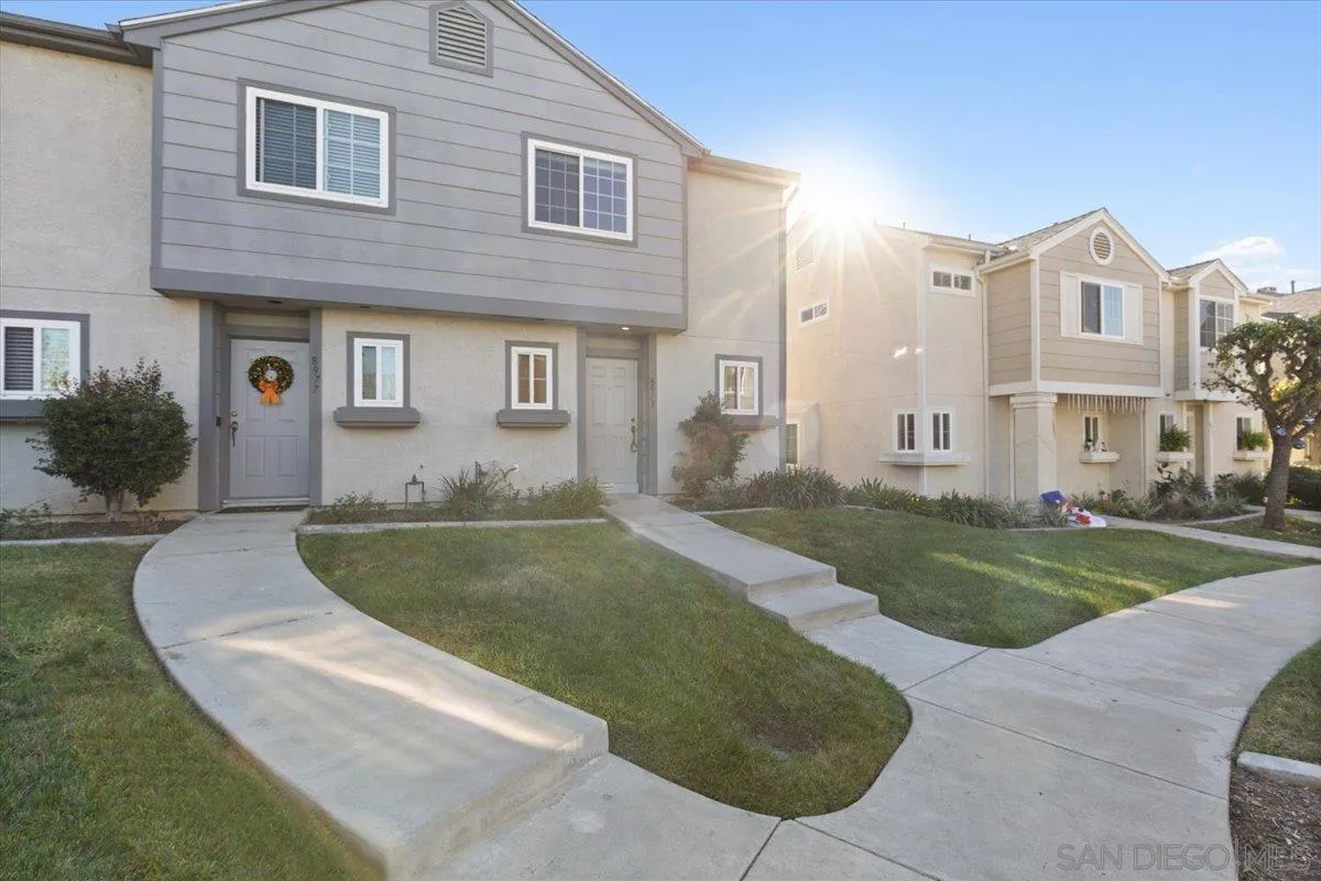 8973 Arlingdale Way Spring Valley, CA 91977 - Photo 18 of 24 a view of a house with a yard
