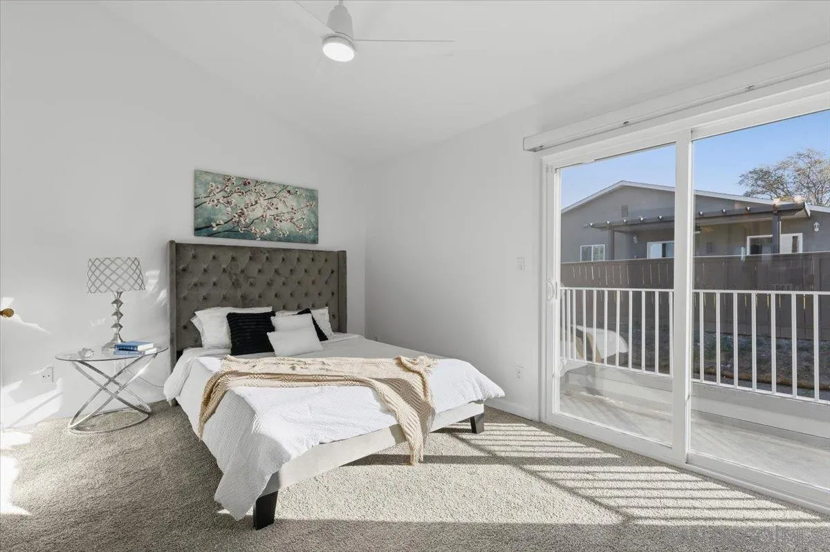 8973 Arlingdale Way Spring Valley, CA 91977 - Photo 6 of 24 a bedroom with a bed and a painting on the wall