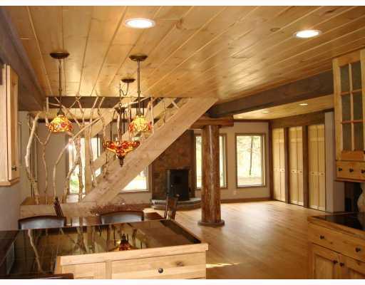 1590 County Line Road Champion, PA 15622 - Photo 9 of 18 Living Room. Large Coat Closets in Entry. Massive Log Pillar adds to Wood Beams & Rustic Trim.