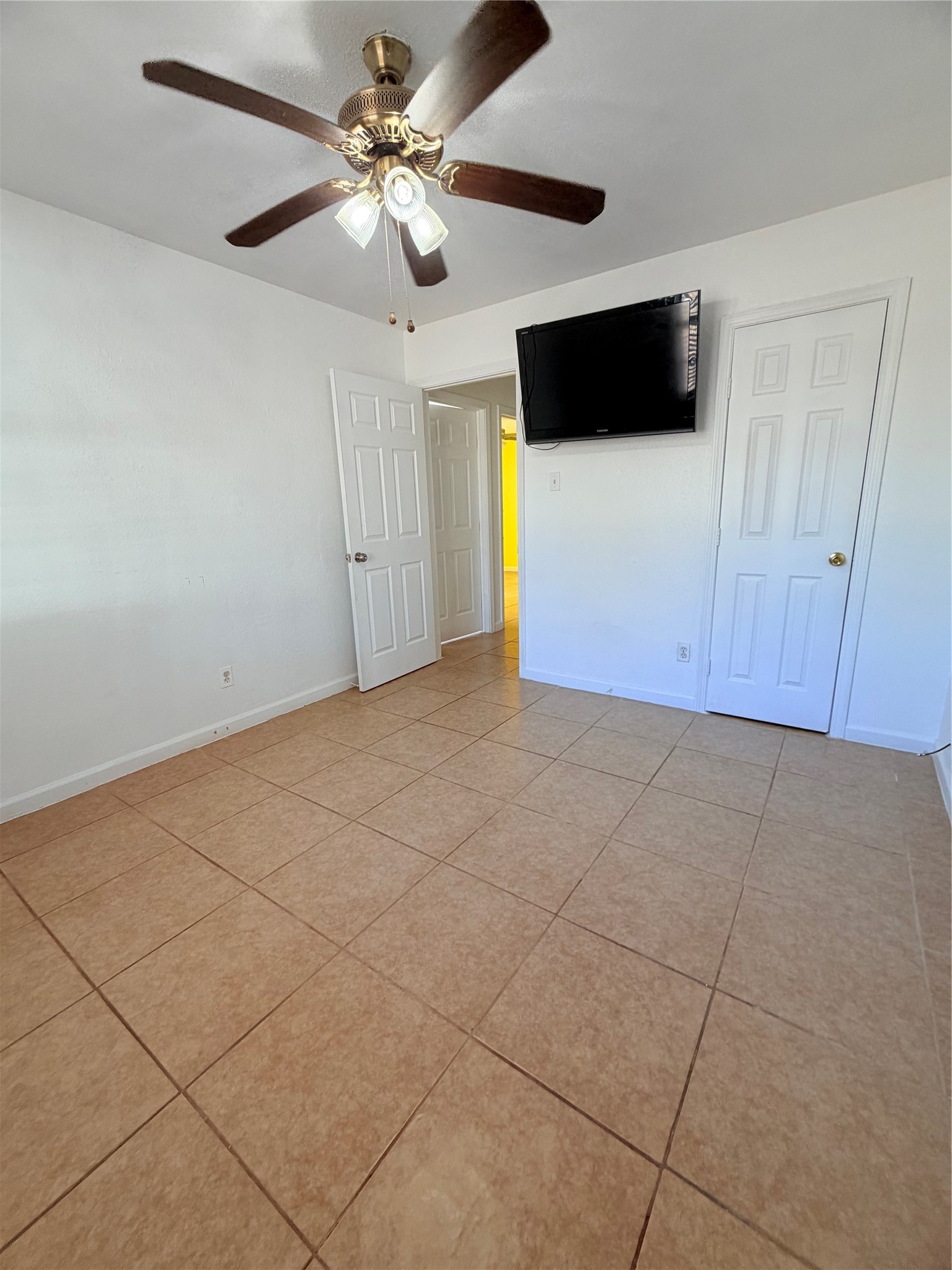 207 Inwood Lane Highlands, TX 77562 - Photo 11 of 20 a view of a livingroom with a flat screen tv