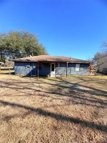 a view of a house with a swimming pool