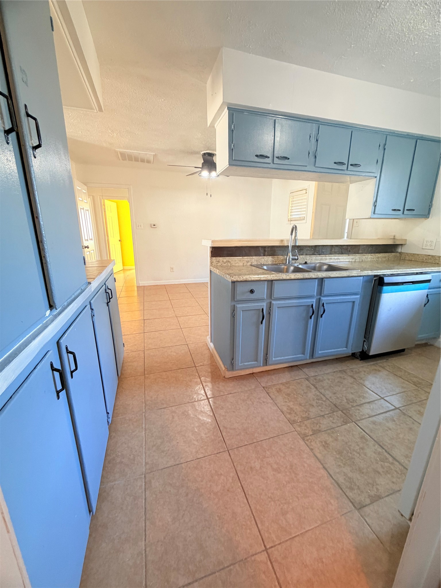 207 Inwood Lane Highlands, TX 77562 - Photo 4 of 20 a kitchen with stainless steel appliances granite countertop a sink stove and cabinets