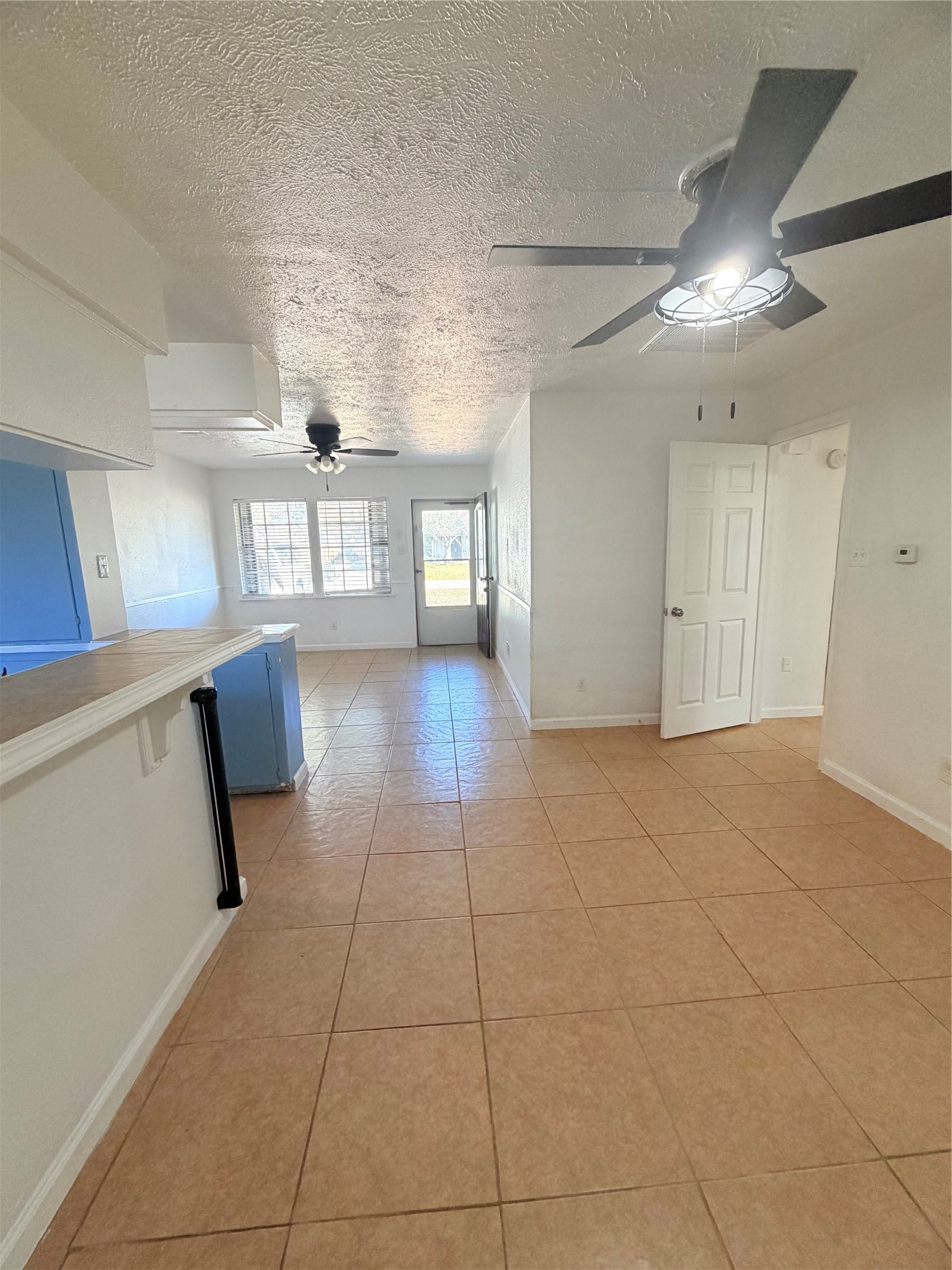 207 Inwood Lane Highlands, TX 77562 - Photo 6 of 20 a view of hallway with stairs and wooden floor