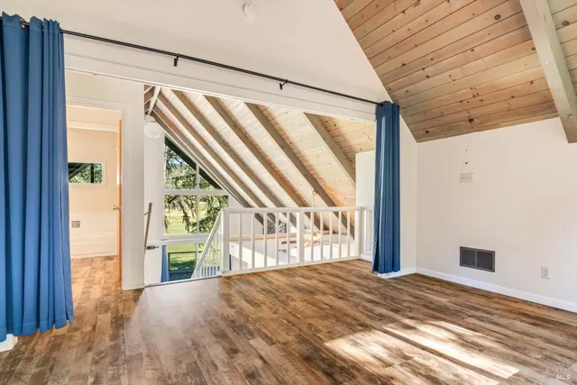 a bathroom with a sink a bathtub and a mirror