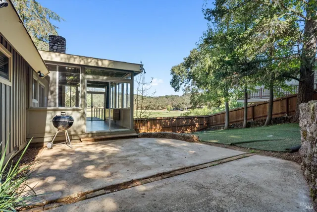 a view of a wooden fence