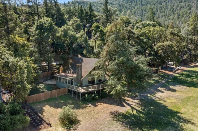 a view of a road with a yard