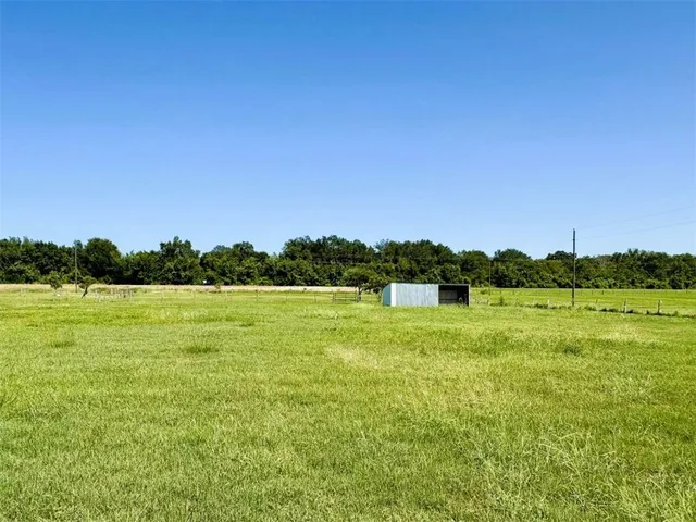 a view of an ocean from a yard
