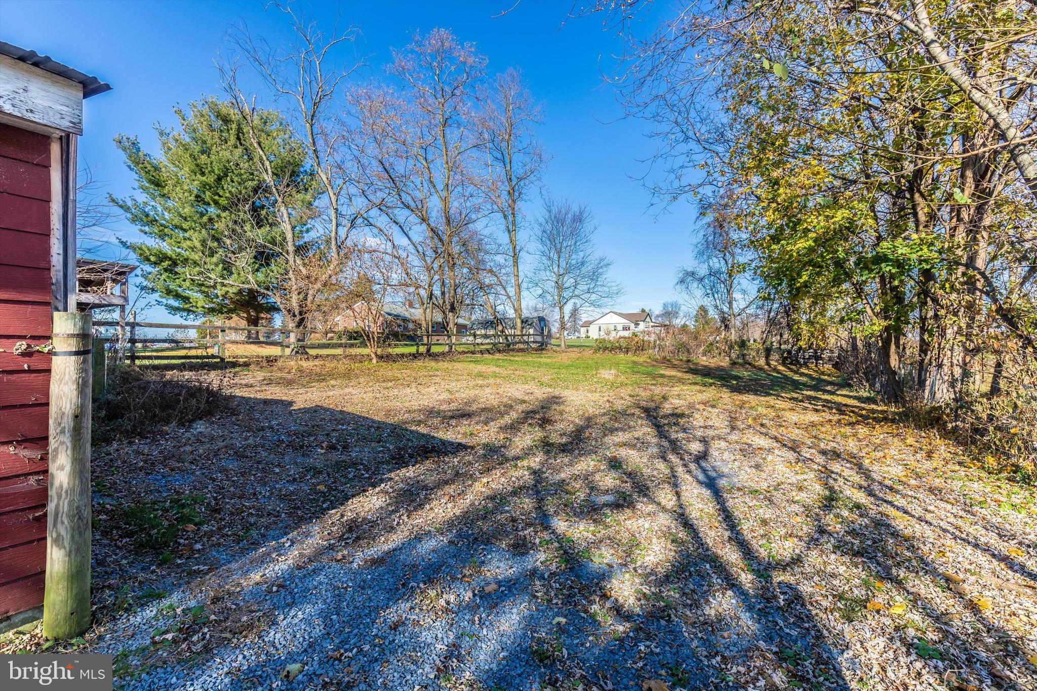 20710 Netz Road Boonsboro, MD 21713 - Photo 26 of 27 Partially Fenced yard past barn