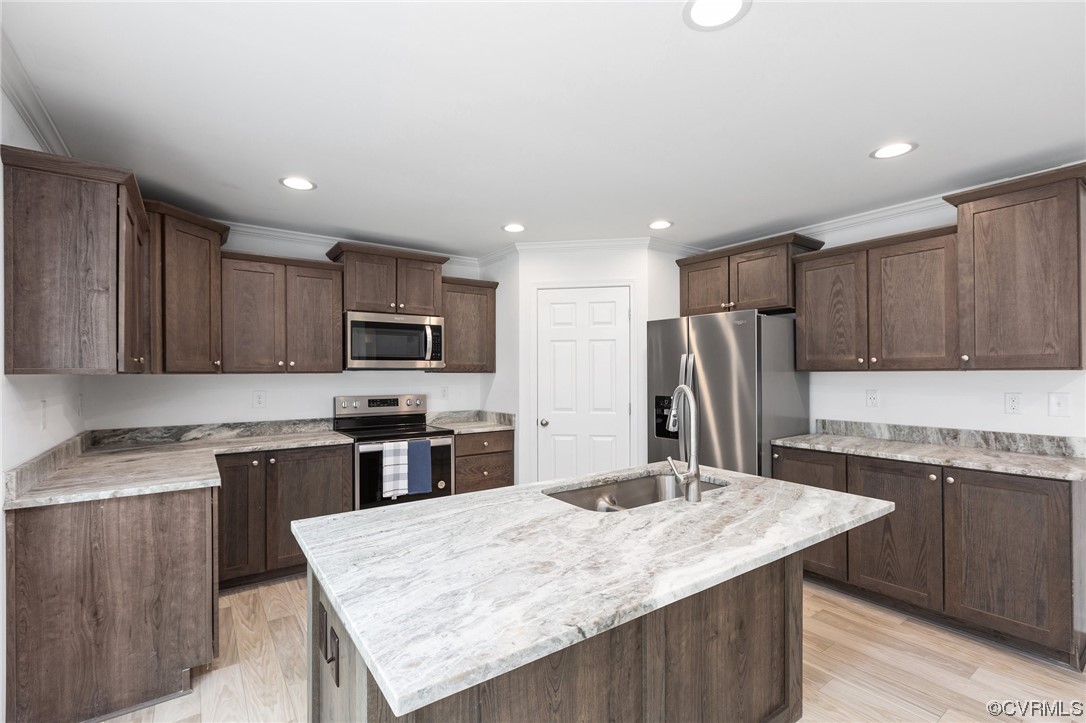 778 Bryants Ford Road Fork Union, VA 23055 - Photo 15 of 50 a kitchen with stainless steel appliances granite countertop a sink stove refrigerator and cabinets