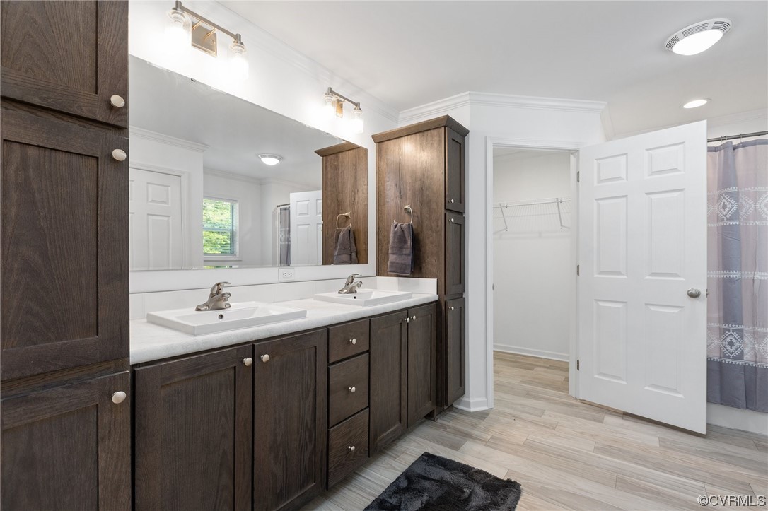 778 Bryants Ford Road Fork Union, VA 23055 - Photo 33 of 50 a bathroom with a double vanity sink and a mirror