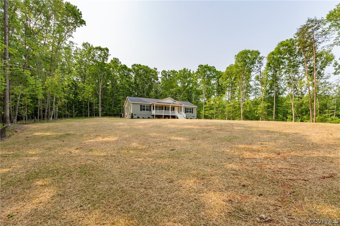 778 Bryants Ford Road Fork Union, VA 23055 - Photo 39 of 50 a house with trees in the background