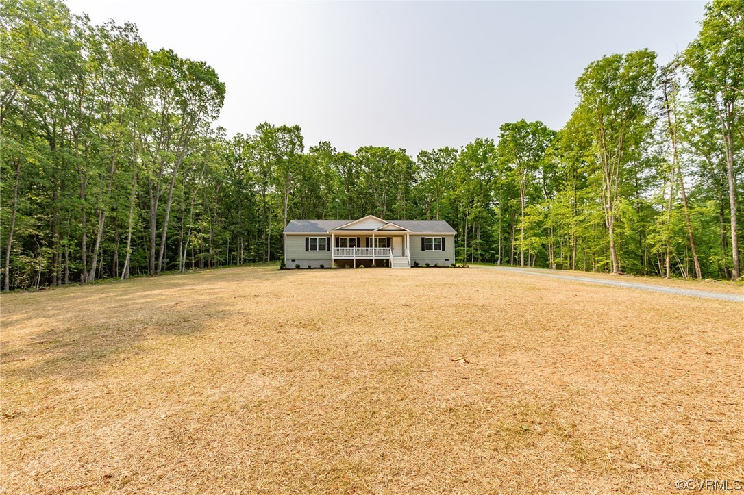 778 Bryants Ford Road Fork Union, VA 23055 - Photo 40 of 50 a house with trees in the background