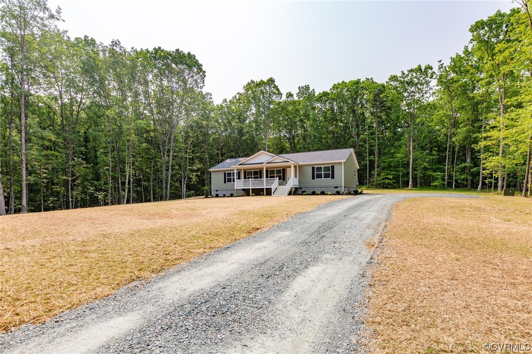 778 Bryants Ford Road Fork Union, VA 23055 - Photo 41 of 50 a house with trees in the background