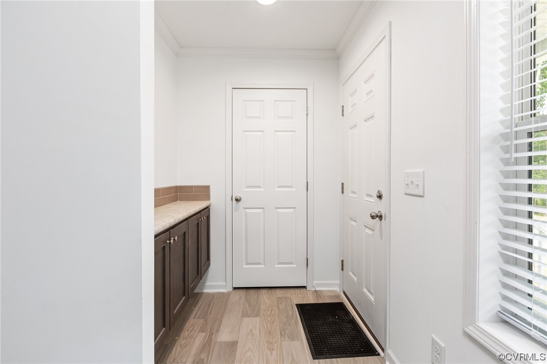 778 Bryants Ford Road Fork Union, VA 23055 - Photo 6 of 50 a view of a hallway with wooden floor and a bathroom