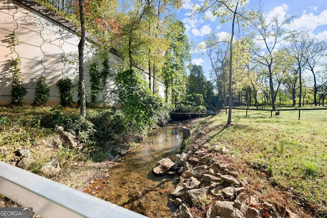 a front view of a house with parking area