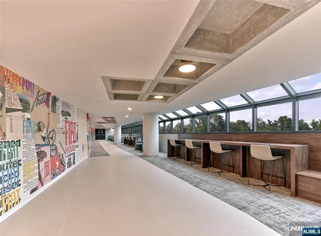 a view of a porch with furniture and a flat screen tv