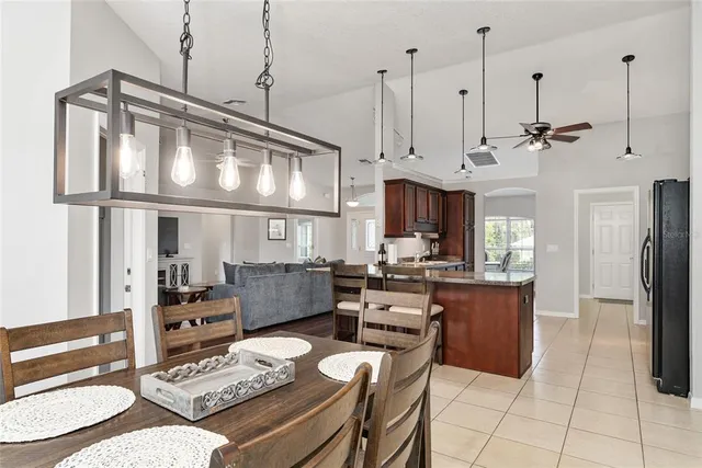 a bathroom with a tub shower and a sink