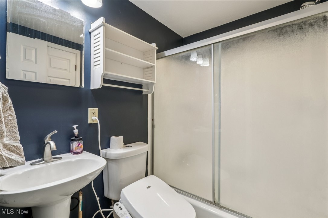 23 Lane Street Rittman, OH 44270 - Photo 17 of 34 Full bath featuring a shower stall and toilet
