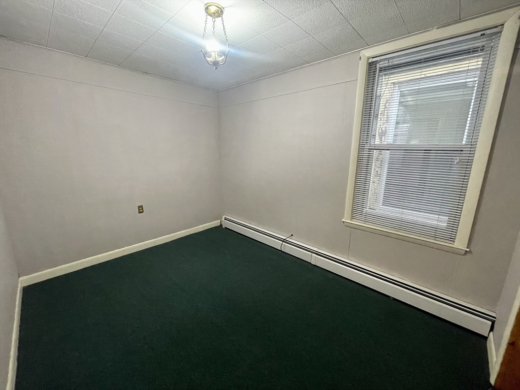 136 Saratoga Street, Unit 2 Boston, MA 02128 - Photo 16 of 19 a view of an empty room with a window