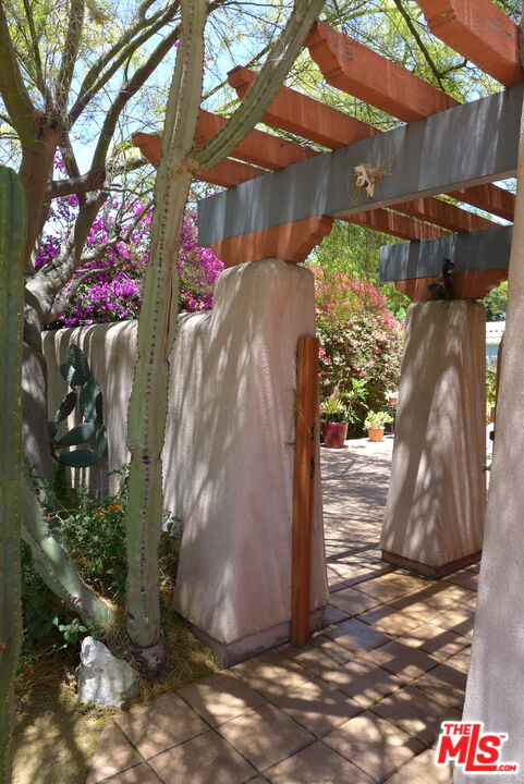 3124 Veteran Avenue Los Angeles, CA 90034 - Photo 6 of 23 a view of a tree in front of house