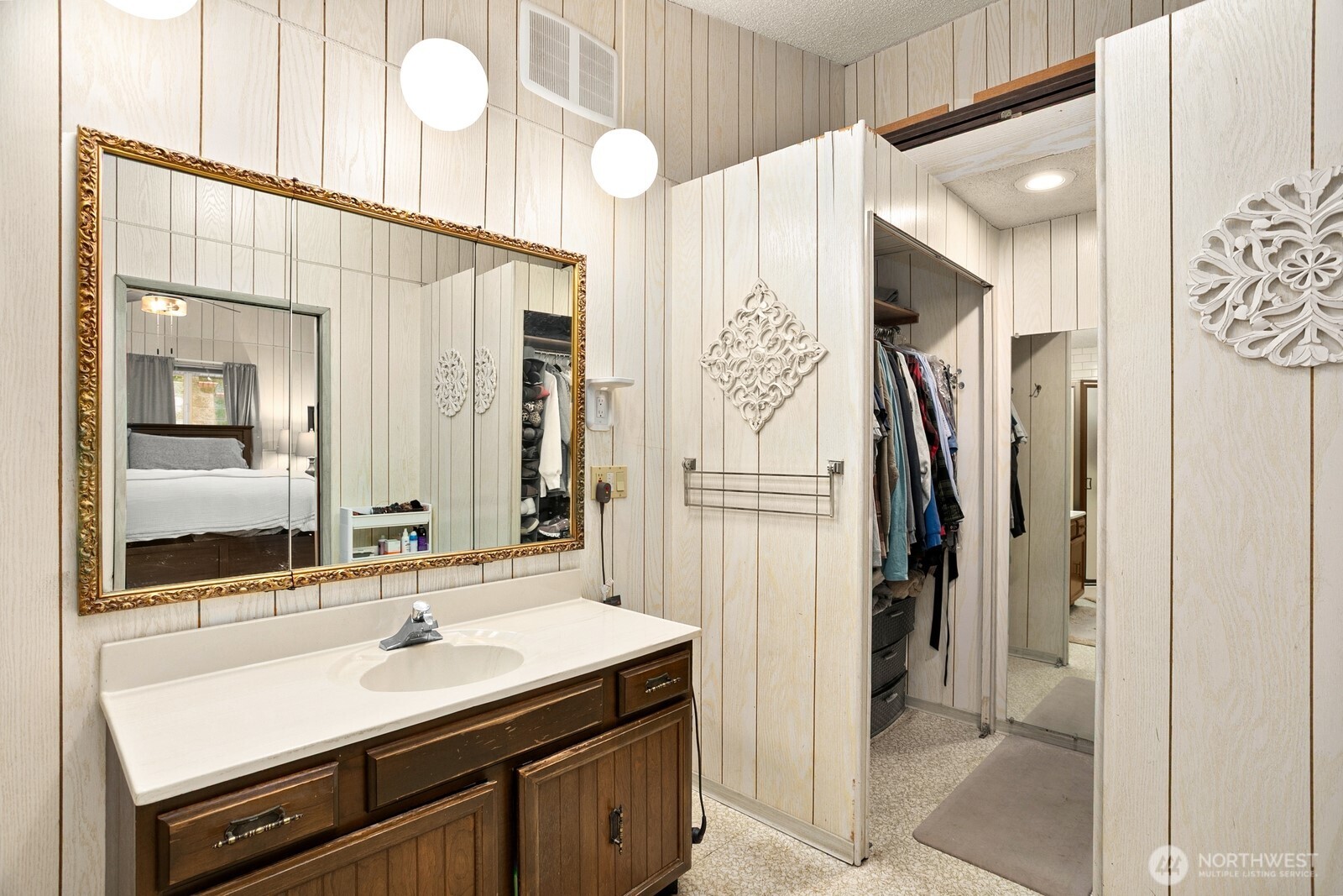 3542 43rd Avenue West Seattle, WA 98199 - Photo 14 of 39 a bathroom with a sink and a mirror