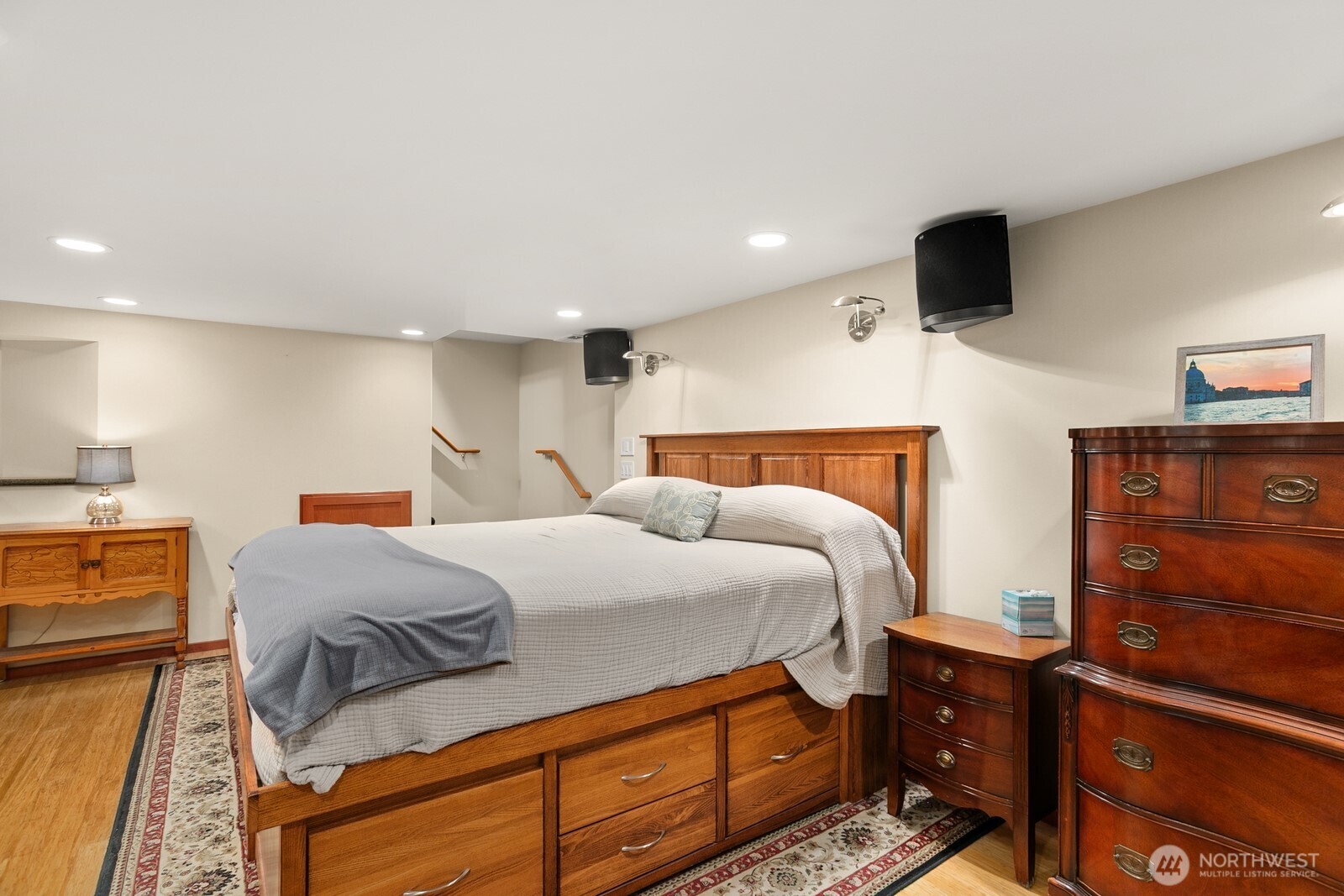 3542 43rd Avenue West Seattle, WA 98199 - Photo 20 of 39 a bedroom with a bed and a television