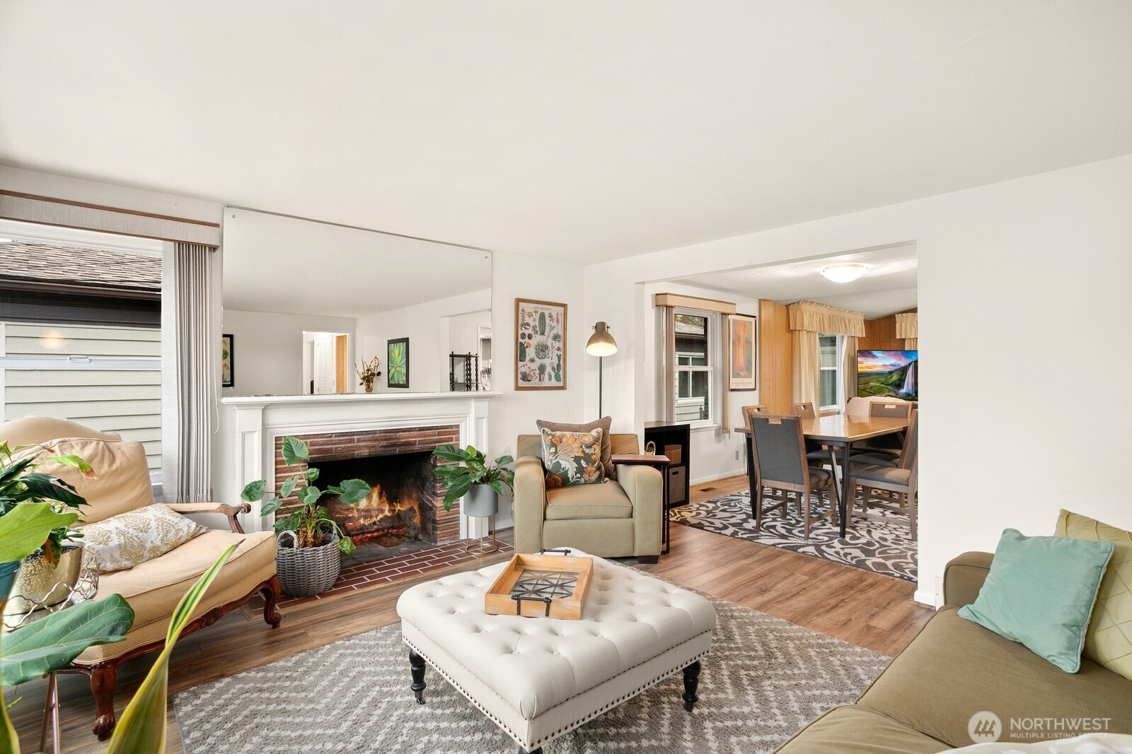 3542 43rd Avenue West Seattle, WA 98199 - Photo 3 of 39 a living room with furniture and a fireplace