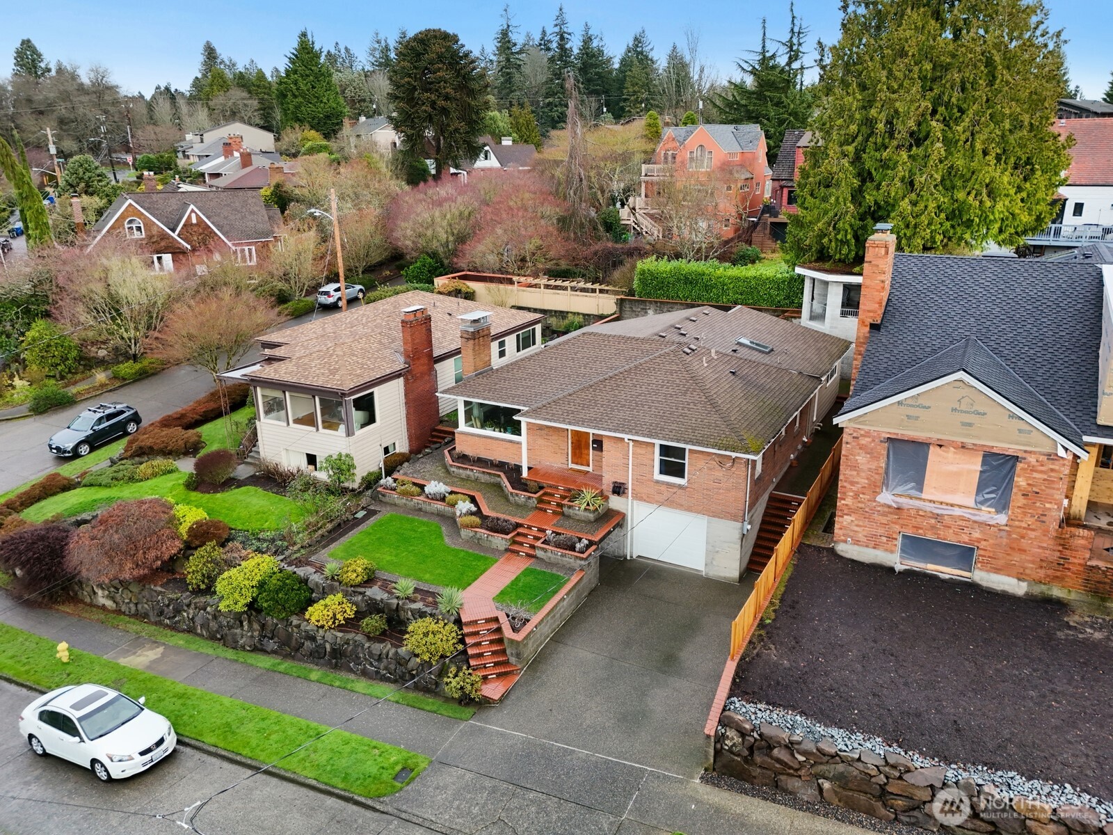 3542 43rd Avenue West Seattle, WA 98199 - Photo 31 of 39 an aerial view of a house with a garden and plants
