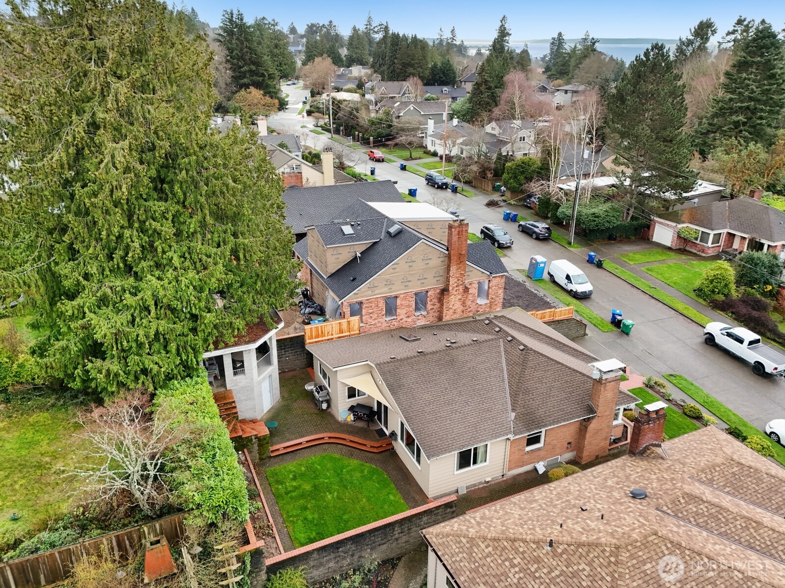 3542 43rd Avenue West Seattle, WA 98199 - Photo 34 of 39 an aerial view of a house with a garden