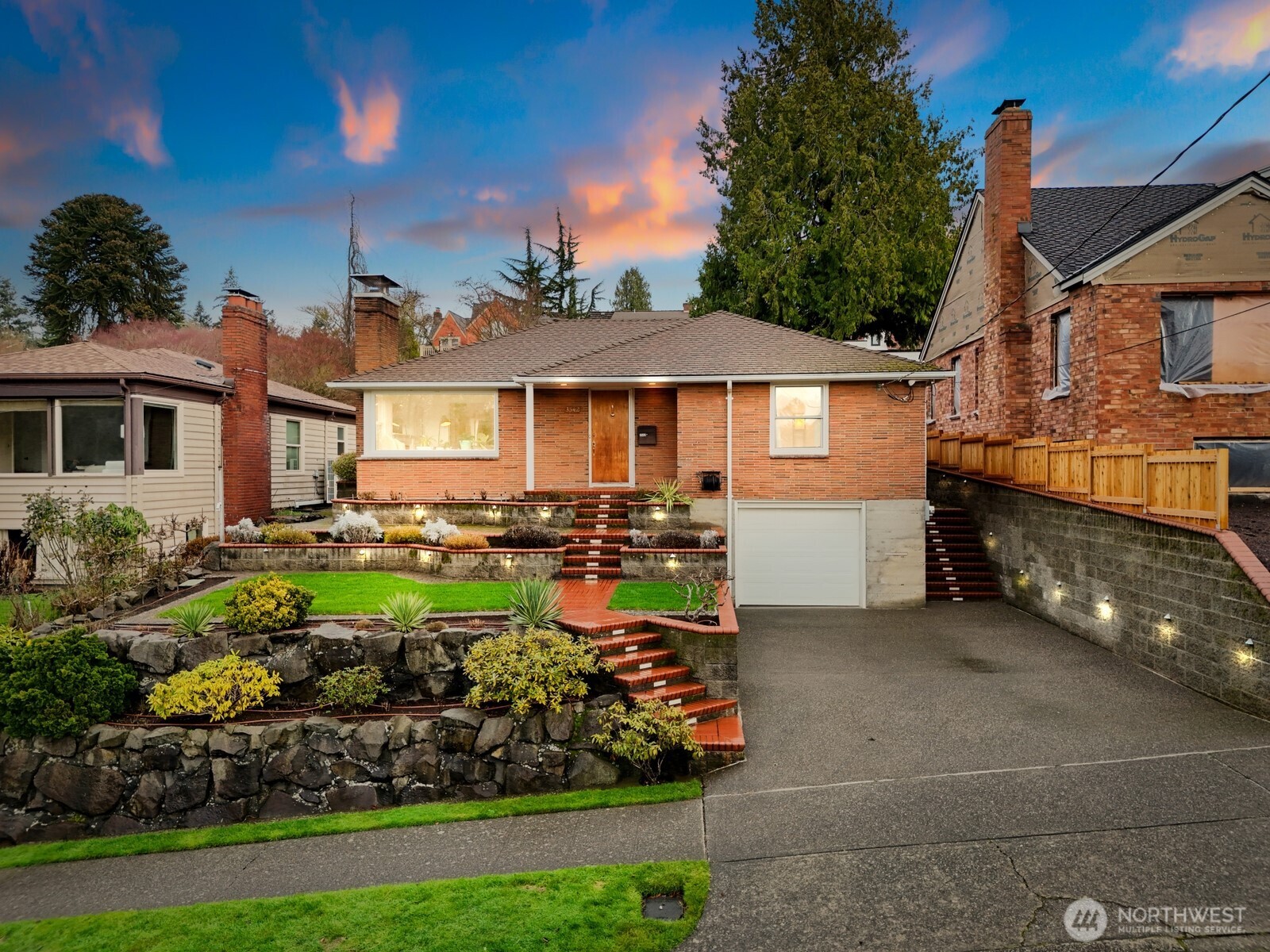 3542 43rd Avenue West Seattle, WA 98199 - Photo 39 of 39 a front view of a house with a garden