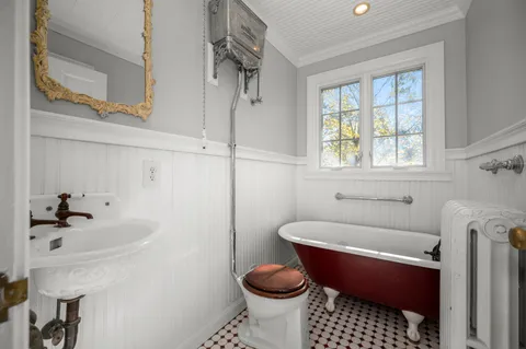 a bathroom with a sink and a toilet