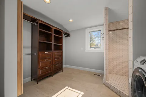 a view of an empty walk in closet