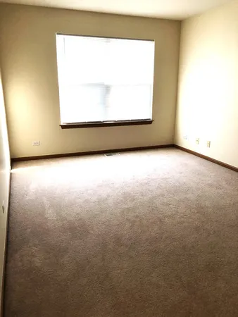 a view of a room with a window