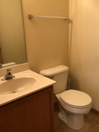 a bathroom with a sink and a toilet