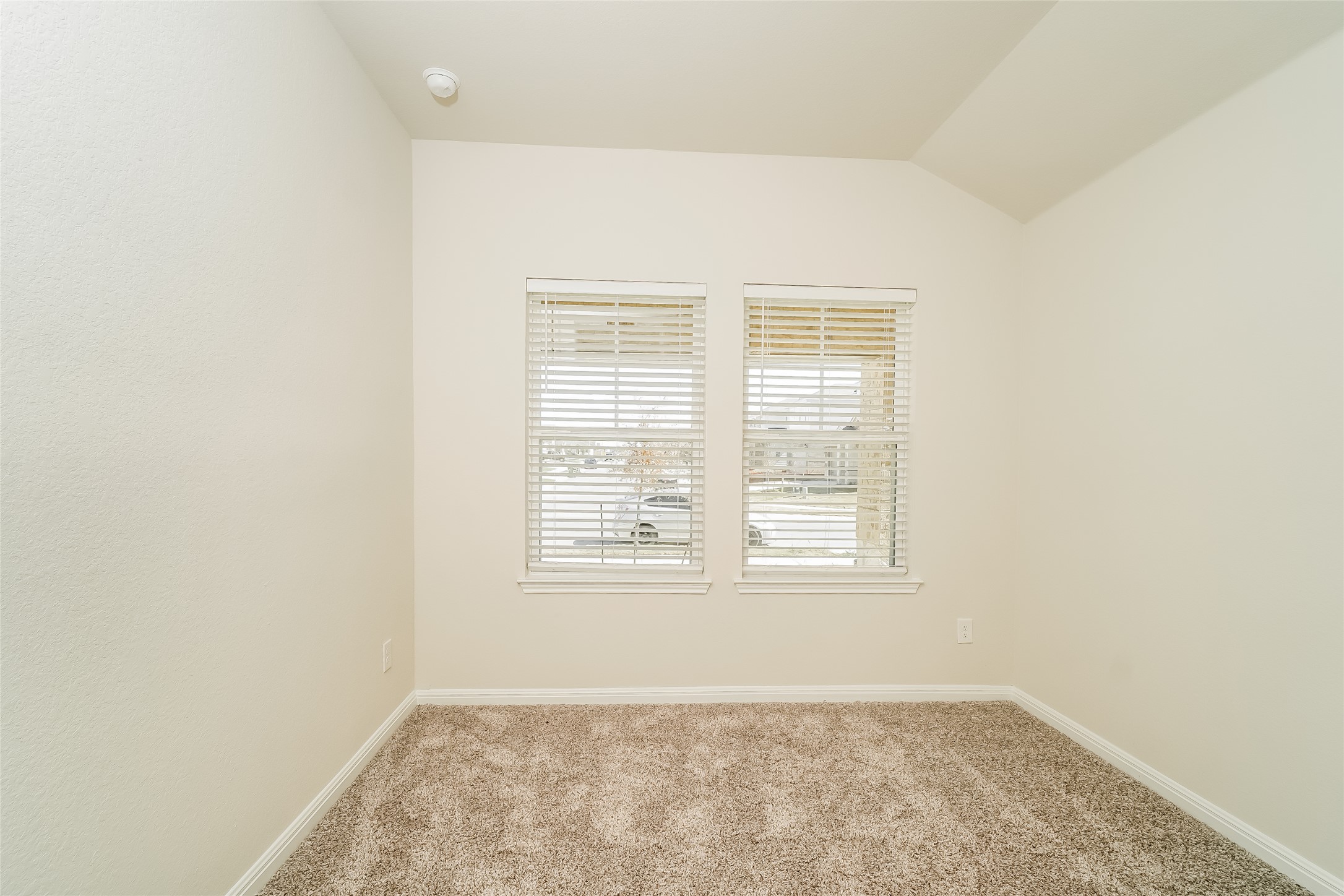 200 Babblebrook Way Hutto, TX 78634 - Photo 11 of 16 an empty room with a window